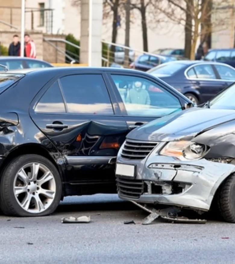 Two cars with significant damage after a collision, illustrating the services of a Car Wreck Attorney in Big Pine Key.