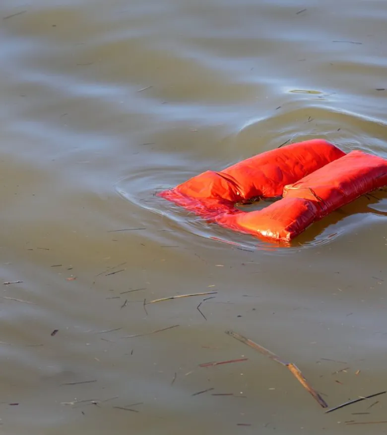 Maritime & Admiralty Attorneys in Tampa, FL - life vest on beach