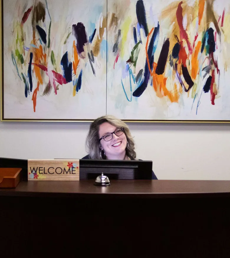 Receptionist smiling