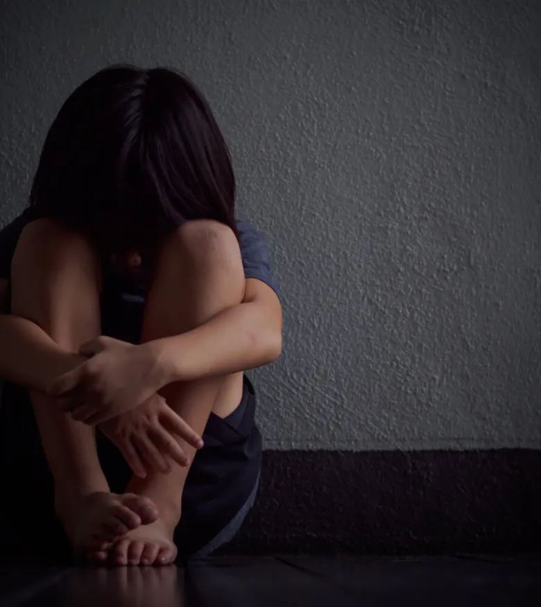 Pursuing Justice for New York Victims of Child Sexual Abuse - women scared in the corner