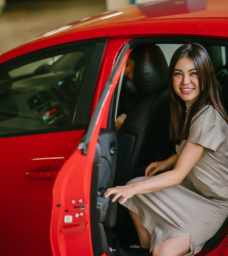 Miami Lyft Accident Lawyers - Woman in red car