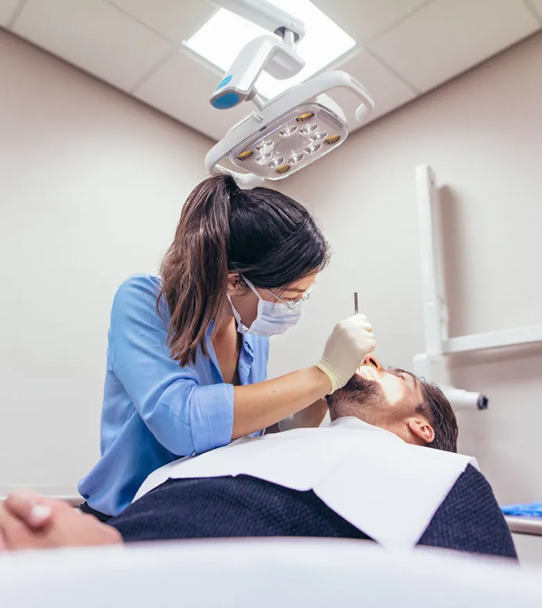 Boston Dental Malpractice Lawyers - Dentist working