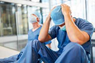 Medical Malpractice Attorneys in Southfield, Michigan (MI) - Two stressed Doctors