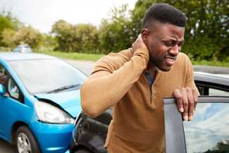 Car Accident Lawyers in New Albany, Indiana (IN) - Man getting out of crashed car