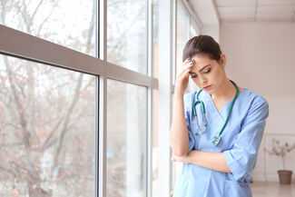 Wrongful Death Attorneys in Southfield, MI - Stressed Doctor