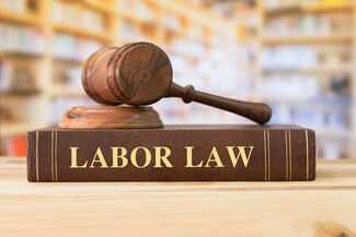 Labor & Employment Attorneys in Evansville, IN - Gavel and Labor Laws Book