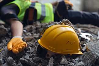 Construction Accident Attorneys in Houston, TX - Construction Worker and Hat on Ground