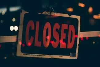 Business Interruption Lawyers Alpharetta, GA - closed business sign