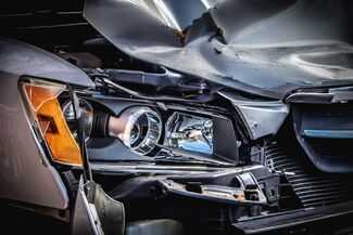 Car Accident Compensation in Miami - car with car crash damages