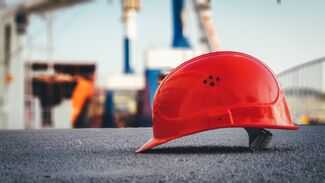 Labor & Employment Attorneys in Melbourne, FL - hard hat at construction site