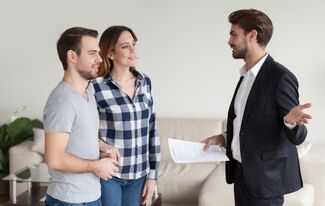 Where Do I Go to File a Case Against My Landlord in New York - Couple speaks with Landlord