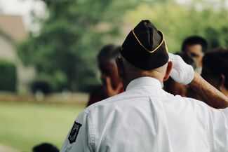 Prestonsburg Veterans Benefits Attorneys - veteran saluting the flag