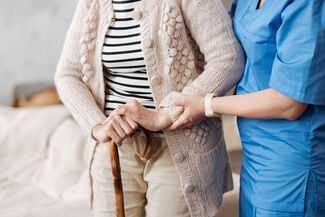 Nursing Home Abuse Attorneys in Palm Harbor, FL - nursing home patient with nurse