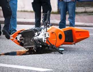 Motorcycle Accident Lawyers in Deland, FL - motorcycle on the floor after an accident