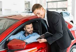 Where Can I Find the Best Rental Car Accident Lawyers in DeLand, FL? - Man renting car