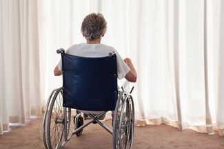 Nursing Home Abuse Attorneys in Atlanta, GA - senior sitting in wheelchair at a nursing home