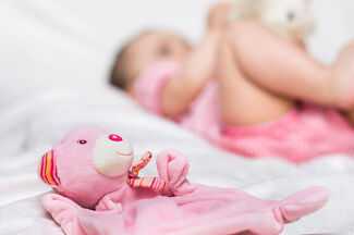 Birth Injury Lawyers in Orlando, FL - Baby with toy