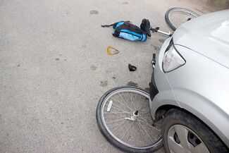 Recover Compensation for Your Bicycle Accident Injury in NYC - Bike under car