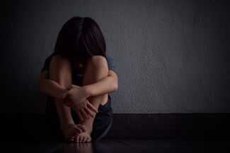 Pursuing Justice for New York Victims of Child Sexual Abuse - women scared in the corner