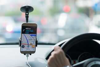 Miami Uber Accident Attorneys - Person driving with GPS