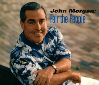 Smiling man in a blue floral shirt sits with arms crossed on a ledge. Background is blurred. Text reads, “John Morgan: Fair the People.”