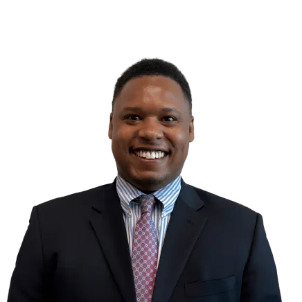 Headshot of ATTORNEY Malik Jackson, a Jacksonville-based personal injury lawyer from Morgan & Morgan
