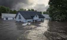 Flood Damage Insurance Claim Lawyers - house in a hurricane