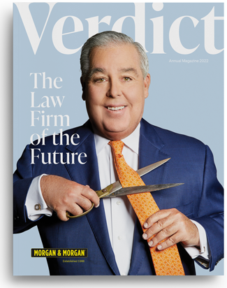 John Morgan and his top staff on the cover of the 2022 Verdicts Magazine