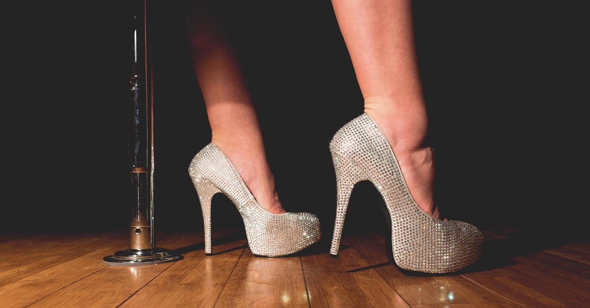 Dancer heels near pole